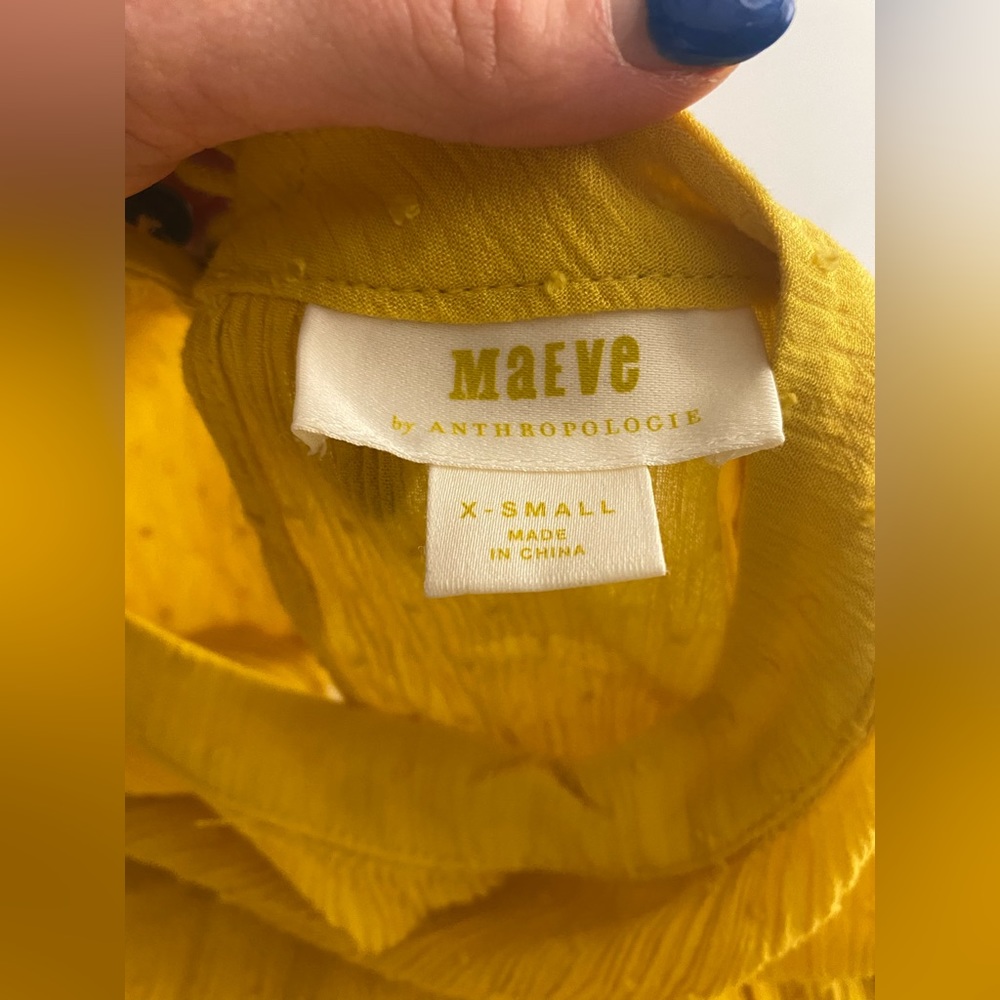 Bright yellow top by Anthropologie